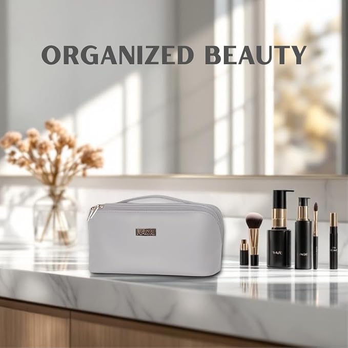 NAORI Travel Makeup Bag for Women | Large Luxury Cosmetic Organizer with Handle & Inner Pockets | Waterproof Leather Toiletry Bag | Makeup Case for Home, Travel & Gifting (Soft Grey)